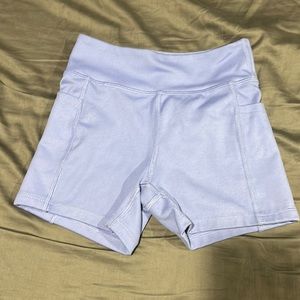 I am selling these athletic sky, blue/lilac colored shorts.